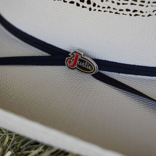 A close up of a Justin Straw cowboy hat.